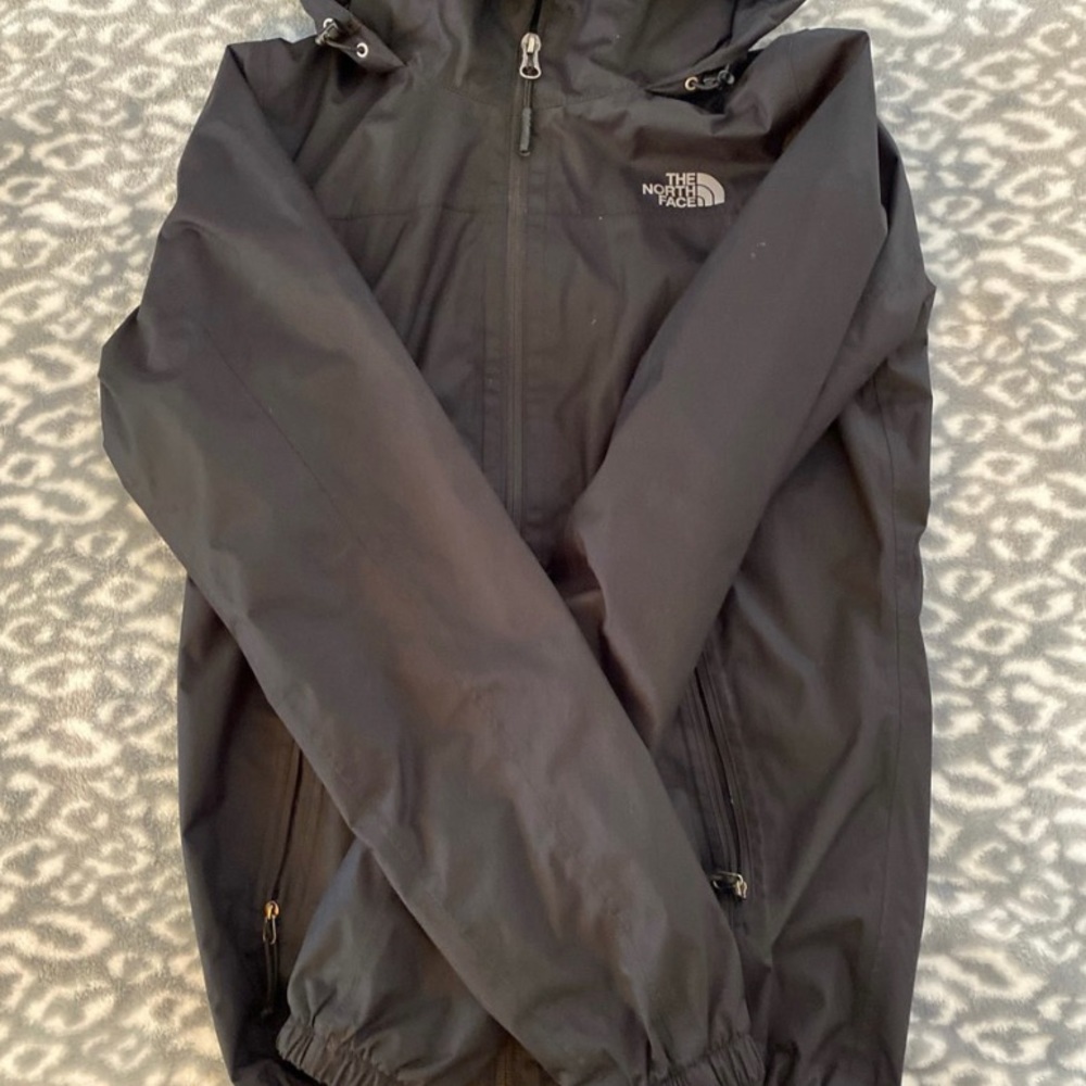 black north face wind breaker